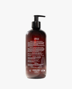 Fluide lavant Terre Ugo en flacon ambré, vue arrière avec les ingrédients et informations produit.